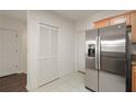 Kitchen with stainless steel appliances and light wood cabinets at 167 Grey Widgeon Ct, Daytona Beach, FL 32119