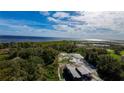 Aerial view of house under construction by the lake at 71 E Lake Shore Blvd, Kissimmee, FL 34744