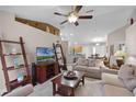 Spacious living room with comfortable seating and a large TV at 806 Knightsbridge Cir, Davenport, FL 33896