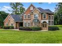 Two-story house with stone and stucco exterior at 8407 River Branch Pl, Sanford, FL 32771