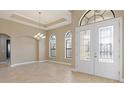 Bright dining room with tiled floors and a chandelier at 8681 Crested Eagle Pl, Sanford, FL 32771