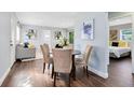 Charming dining area with a round table and four chairs, near the living room at 1062 Reams St, Longwood, FL 32750