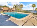 Community pool with lake view at 1836 N Crystal Lake Dr # 31, Lakeland, FL 33801