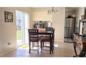 Bright dining area with a table and chairs, near the kitchen at 2314 Carriage Run Rd, Kissimmee, FL 34741