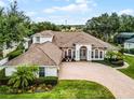 Property with a large backyard and a two-car garage at 1869 Merlot Dr, Sanford, FL 32771