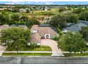 Home in a residential neighborhood with lush greenery at 1869 Merlot Dr, Sanford, FL 32771