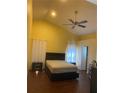 Bright main bedroom with high ceilings and ceiling fan at 1844 Oxton Ct, Ocoee, FL 34761