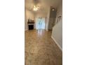Spacious living room featuring a fireplace and tile flooring at 174 Waterfall Way # 106, Altamonte Springs, FL 32714