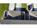 Aerial view showcasing the home's backyard patio and parking area at 4803 Apple Blossom Ln # 4803, St Cloud, FL 34771