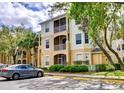 Condo building with ample parking and landscaping at 6214 Stevenson Dr # 303, Orlando, FL 32835
