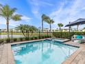 Private pool with spa and patio furniture at 8020 Shaker St, Kissimmee, FL 34747