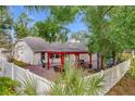 Relaxing backyard oasis with a gazebo and brick patio at 1725 Singing Palm Dr, Apopka, FL 32712