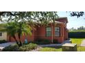 Attractive single-story home with landscaping and a two-car garage at 836 Grand Canal Dr, Kissimmee, FL 34759
