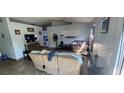 Bright living room with an open floor plan and view of kitchen at 871 Lake Jackson Cir, Apopka, FL 32703