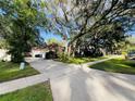 House exterior showing driveway and landscaping at 252 Shady Oaks Cir, Lake Mary, FL 32746