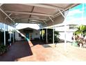 Mobile home with carport and paved driveway at 2025 St George Dr, Davenport, FL 33837