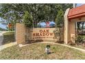 Oak Shadows Condominium entrance sign, welcoming residents and visitors to the community at 2850 N Powers Dr # 9, Orlando, FL 32818