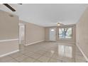 Bright living room with tile floors and ceiling fan at 725 Northlake Blvd # 45, Altamonte Springs, FL 32701