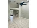 Spacious living room with high ceilings at 218 Meadow Green Dr, Davenport, FL 33837
