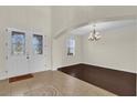 Elegant foyer with high ceilings and hardwood floors at 19206 Robertson St, Orlando, FL 32833