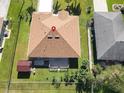 Aerial view of house with backyard and shed at 552 Eagle Ct, Poinciana, FL 34759