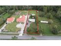 Aerial view of property showing a mobile home and large lot at 1111 Sunflower Trl, Orlando, FL 32833