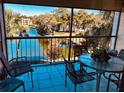 Spacious balcony overlooking a lake with patio furniture at 3 Escondido Cir # 18, Altamonte Springs, FL 32701