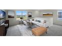 Spacious living room with large windows, sectional sofa, and a coffee table at 2842 Moulin Rd, Davenport, FL 33837