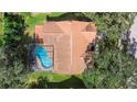Home with pool and screened enclosure, top-down view at 6618 Abeydon Ct, Orlando, FL 32818