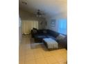 Living room with sectional sofa and ample space at 1241 Melontree Ct # 6, Gotha, FL 34734