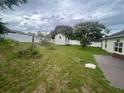 Large backyard with shed and grassy area at 2562 Providence Blvd, Deltona, FL 32725