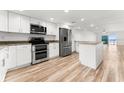 Modern kitchen with stainless steel appliances and granite countertops at 3807 S Atlantic Ave # 2020, Daytona Beach, FL 32118