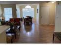 Bright dining area with wood flooring and a table for six at 2202 Key West Ct # 632, Kissimmee, FL 34741