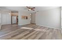 Bright living room featuring wood-look floors at 13303 Pinyon Dr, Clermont, FL 34711