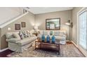 Cozy living room with neutral furniture and access to patio at 3214 Gold Ln, Kissimmee, FL 34747