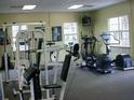 Community fitness center with various cardio and weight training equipment at 6106 Westgate Dr # 102, Orlando, FL 32835