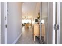 Bright and airy entryway with a view into the dining area at 172 Villa Domani Cir, Davenport, FL 33896