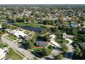 Aerial view showing home's location near water, neighborhood context, and surrounding houses at 3607 Datura Ct, Winter Park, FL 32792