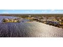Wide aerial view of waterfront property and cityscape at 225 W Seminole Blvd # 206, Sanford, FL 32771