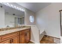 Bathroom boasts granite countertops and a relaxing soaking tub at 762 Toulon Dr, Kissimmee, FL 34759
