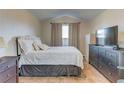 Spacious bedroom with a comfortable bed and ample closet space at 762 Toulon Dr, Kissimmee, FL 34759