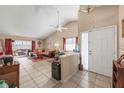 Spacious living room with tile floors and access to backyard patio at 1067 Cheltanham Ct, Longwood, FL 32750