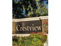 Crestview community entrance sign with landscaping at 7135 Yacht Basin Ave # 237, Orlando, FL 32835