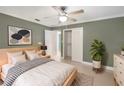 Cozy bedroom with a large closet and a calming color palette at 2410 Sanford Ave, Sanford, FL 32771