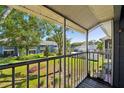 Screened porch overlooking a green backyard at 5417 Lake Margaret Dr # G, Orlando, FL 32812