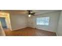 Bright and airy living room with tile floors at 4518 Watch Hill Rd, Orlando, FL 32808