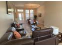 Spacious living room with ample natural light and comfortable seating at 912 Hire Cir, Ocoee, FL 34761