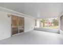 Screened porch with access to the backyard at 4 Cedar Trace Way, Ocala, FL 34472