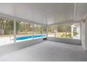 Screened porch overlooking the backyard pool at 4 Cedar Trace Way, Ocala, FL 34472