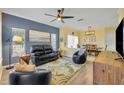 Open living area with comfortable seating and hardwood floors at 1812 Arbor Lakes Cir # 1812, Sanford, FL 32771